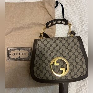 Gucci GG leather-trimmed printed coated-canvas crossbody satchel